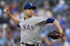 Texas Rangers starting pitcher Jacob deGrom throws to a Kansas City Royals batter during the first inning of a baseball game, Monday, April 17, 2023, in Kansas City, Mo. (AP Photo/Reed Hoffmann)