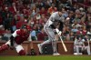 Arizona Diamondbacks' Pavin Smith watches his grand slam as St. Louis Cardinals catcher Willson Contreras, left, kneels at the plate during the seventh inning of a baseball game Monday, April 17, 2023, in St. Louis. (AP Photo/Jeff Roberson)