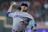 Toronto Blue Jays starting pitcher Kevin Gausman delivers during the first inning of a baseball game against the Houston Astros, Monday, April 17, 2023, in Houston. (AP Photo/Kevin M. Cox)
