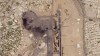 This satellite photo from Planet Labs PBC shows damaged aircraft, including one on fire, at Khartoum International Airport in Khartoum, Sudan, Monday, April 17, 2023. Satellite images from Planet Labs PBC analyzed Tuesday by The Associated Press show the extent of the destruction from days of fighting in Sudan between rival military forces, including some 20 aircraft either damaged or destroyed at Khartoum's airport. (Planet Labs PBC via AP)