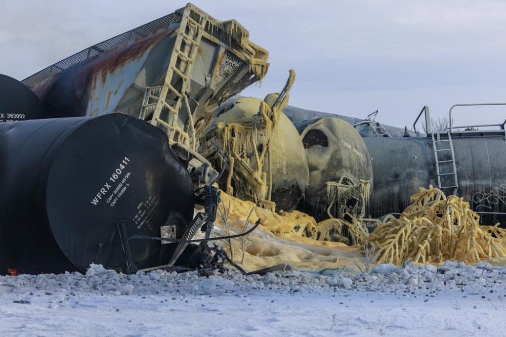 FILE - Train cars pile up after a BNSF freight train derailed on March 30, 2023, near Raymond, Minn. Federal investigators said Tuesday, April 18, that BNSF railroad is analyzing a section of fractured rail after last month's fiery derailment that prompted evacuations in southwest Minnesota, but they didn't say definitively that the broken rail caused the crash. (Kerem Yücel/Minnesota Public Radio via AP, File)