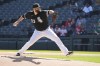 Chicago White Sox starting pitcher Lance Lynn winds up during the first inning in game one of a baseball double header against the Philadelphia Phillies Tuesday, April 18, 2023, in Chicago. (AP Photo/Charles Rex Arbogast)