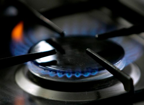 FILE - A gas-lit flame burns on a natural gas stove. The city of Berkeley, Calif., will likely appeal a Monday, April 17, 2023, ruling by a three-judge panel of the 9th U.S. Circuit Court of Appeals that struck down its first-in-the-nation ban on natural gas in new construction. About a dozen other cities and counties in California are also in limbo on an issue that has divided Democrats and Republicans over environmentalism and personal liberty. (AP Photo/Thomas Kienzle, File)