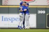 Toronto Blue Jays' Kevin Kiermaier, left, George Springer, center, and Daulton Varsho celebrate the team's win over the Houston Astros in a baseball game Tuesday, April 18, 2023, in Houston. (AP Photo/Eric Christian Smith)