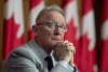 Sen. Pierre-Hugues Boisvenu listens to a virtual speaker 
during a news conference in Ottawa, Tuesday March 30, 2021. The federal Conservatives' top Quebec Tory says the party's concerns about the CBC do not apply to the broadcaster's French-language wing, but one of its senators suggests there is a need to look at it mandate. THE CANADIAN PRESS/Adrian Wyld