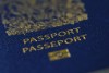 A Canadian passport is pictured in Ottawa on Tuesday, Jan. 17, 2023. Canadians looking to renew their passports are among those feeling the effects of the strike by more than 155,000 public servants that began after the country's biggest federal public-sector union and the government failed to reach a deal by a Tuesday evening deadline. THE CANADIAN PRESS/Sean Kilpatrick