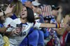 United States fans cheer during the second half of the inaugural Continental Clasico exhibition soccer match against Mexico, Wednesday, April 19, 2023, in Glendale, Ariz. (AP Photo/Matt York)