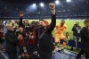 From left, AC Milan coach Stefano Pioli, Brahim Diaz, Fikayo Tomori Olivier Giroud and Mike Magnan celebrate at the end of the Champions League quarterfinal second leg soccer match between Napoli and AC Milan, at Naples' Diego Armando Maradona stadium, Tuesday April 18, 2023. The match ended in a 1-1 draw and AC Milan advanced to the semifinal on a 2-1 aggregate. (Alessandro Garofalo/LaPresse via AP)