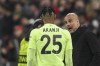Manchester City's head coach Pep Guardiola, right, gives instructions to Manchester City's Manuel Akanji prior the Champions League quarter finals second leg soccer match between Bayern Munich and Manchester City, at the Allianz Arena stadium in Munich, Germany, Wednesday, April 19, 2023. (AP Photo/Andreas Schaad)