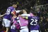 Fiorentina players celebrate after Fiorentina's Riccardo Sottil scored to 1-3 during the UEFA Europa Conference League quarter final second leg soccer match between Fiorentina and Lech Poznan at the Artemio Franchi stadium in Florence, Italy, Thursday April 20, 2023. (Massimo Paolone/LaPresse via AP)