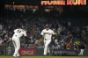 San Francisco Giants' LaMonte Wade Jr., right, is congratulated by third base coach Mark Hallberg on a solo home run against the New York Mets during the fifth inning of a baseball game in San Francisco, Thursday, April 20, 2023. (AP Photo/Tony Avelar)