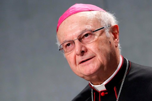 FILE - Archbishop Robert Zollitsch, then chairman of the German Episcopal Conference, speaks during a press conference at the Vatican, Monday, Oct. 14, 2013. Zollitsch is giving up the country's highest honor, the Order of Merit, which was bestowed on him in 2014, following scathing criticism this week of his handling of clergy abuse cases during his tenure as archbishop of Freiburg and as a personnel officer in the diocese. (AP Photo/Riccardo De Luca, File)