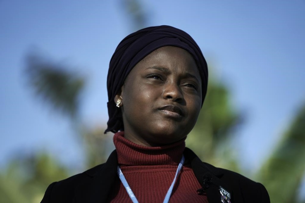 FILE - Nakeeyat Dramani Sam, of Ghana, poses for photos at the COP27 U.N. Climate Summit, Friday, Nov. 18, 2022, in Sharm el-Sheikh. Now 11, Sam is critical of the older generation, saying that