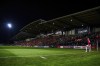 Wrexham's Elliott Lee prepares to take a corner during the National League soccer match between Wrexham and Yeovil Town at the Racecourse Ground, Wrexham, Wales, Tuesday, April 18, 2023. (AP Photo/Jon Super)