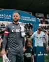 Vancouver FC goalkeeper Callum Irving (left) leads out expansion Vancouver FC in its debut Canadian Premier League game Saturday, April 15, 2023, against Pacific FC at Starlight Stadium in Langford, B.C. THE CANADIAN PRESS/HO-Canadian Premier League **MANDATORY CREDIT**