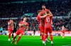 Augsburg's Dion Beljo, top right, celebrates after scoring to 1-0 against Stuttgart goalkeeper Fabian Bredlow during the Bundesliga soccer match between FC Augsburg and VfB Stuttgart, at the WWK Arena in Augsburg, Germany, Friday April 21, 2023. (Tom Weller/dpa via AP)