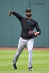 Miami Marlins starting pitcher Sandy Alcántara warms up before a baseball game against the Cleveland Guardians, Friday, April 21, 2023, in Cleveland. (AP Photo/Nick Cammett)