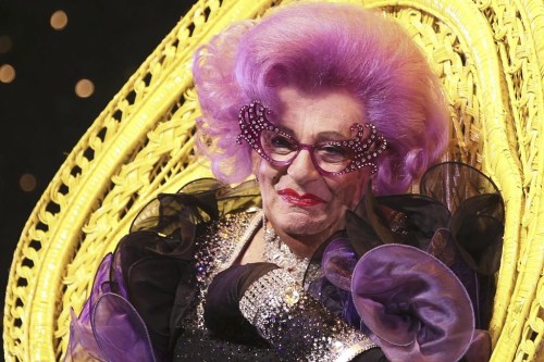 FILE - Australian actor Barry Humphries, dressed as Dame Edna Everage, speaks to the media ahead of her farewell show 