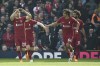 Liverpool's Diogo Jota, left, celebrates after scoring during the Premier League soccer match between Liverpool and Nottingham Forest at Anfield, in Liverpool, England, Saturday April 22, 2023. (AP Photo/Rui Vieira)