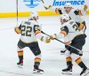 Vegas Golden Knights' Michael Amadio (22), Brett Howden (21) and Ivan Barbashev (49) celebrate Amadio's game-winning goal in the second overtime period of NHL playoff action against the Winnipeg Jets in Winnipeg on Saturday, April 22, 2023. THE CANADIAN PRESS/John Woods
