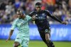 Portland Timbers midfielder Diego Chará, left, battles with FC Cincinnati defender Yerson Mosquera during the second half of an MLS soccer match Saturday, April 22, 2023, in Cincinnati. (AP Photo/Jeff Dean)