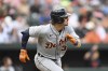 Detroit Tigers' Zach McKinstry runs to first on a double against the Baltimore Orioles in the second inning of a baseball game, Sunday, April 23, 2023, in Baltimore. (AP Photo/Gail Burton)