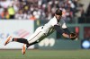 San Francisco Giants second baseman Thairo Estrada watches his throw to first during the fourth inning of a baseball game against the New York Mets in San Francisco, Sunday, April 23, 2023. Jeff McNeil singled on the play. (AP Photo/Godofredo A. Vásquez)