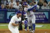 Los Angeles Dodgers' Clayton Kershaw, left, celebrates as he strikes out New York Mets' Tommy Pham to end the top of the seventh inning of a baseball game Tuesday, April 18, 2023, in Los Angeles. (AP Photo/Mark J. Terrill)