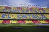 Barcelona fans fans support their team prior a Spanish La Liga soccer match between Barcelona and Atletico Madrid, at the Camp Nou stadium in Barcelona, Spain, Sunday, April 23, 2023. (AP Photo/Joan Mateu)