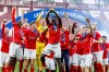 Alkmaar's Ernest Poku celebrates with his teammates and the Youth League trophy after the Youth League final soccer match between AZ Alkmaar and HNK Hajduk Split at the Stade de Geneve stadium, in Geneva, Switzerland, Monday, April 24, 2023. (Salvatore Di Nolfi/Keystone via AP)