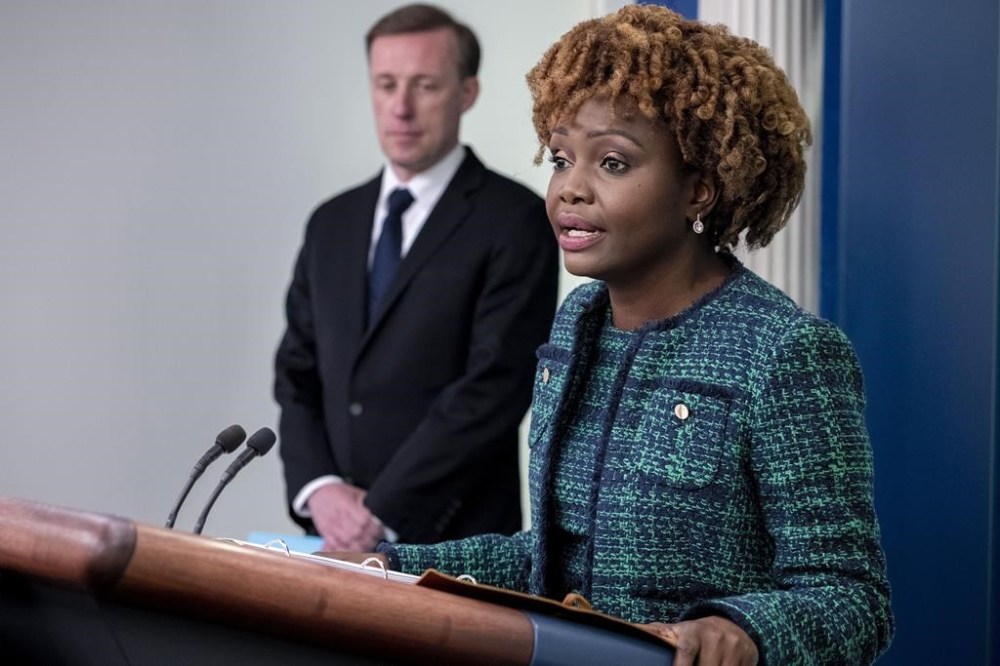 White House press secretary Karine Jean-Pierre, right, accompanied by White House national security adviser Jake Sullivan, left, speaks at a press briefing at the White House in Washington, Monday, April 24, 2023. (AP Photo/Andrew Harnik)