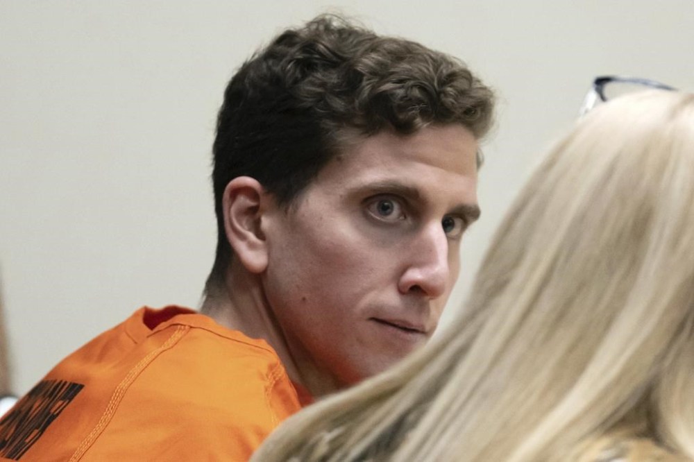 FILE - Bryan Kohberger, left, who is accused of killing four University of Idaho students in November 2022, looks toward his attorney, during a hearing in Latah County District Court, Jan. 5, 2023, in Moscow, Idaho. The Idaho Supreme Court on Monday, April 24, 2023, rejected a request by 30 news organizations to lift a gag order in the criminal case of Kohberger. (AP Photo/Ted S. Warren, Pool,File)