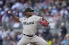 Miami Marlins starting pitcher Edward Cabrera (27) delivers in the first inning of a baseball game against the Atlanta Braves Monday, April 24, 2023, in Atlanta. (AP Photo/Brynn Anderson)