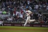Atlanta Braves' Sean Murphy (12) runs the bases after hitting a home run in the third inning of a baseball game against the Atlanta Braves, Monday, April 24, 2023, in Atlanta. (AP Photo/Brynn Anderson)