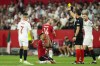 Referee Artur Dias shows a yellow card to Manchester United's Casemiro during the Europa League quarter finals second leg soccer match between Sevilla and Manchester United, at the Ramon Sanchez Pizjuan stadium in Seville, Spain, Thursday, April 20, 2023. (AP Photo/Jose Breton)