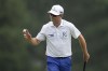 Zach Johnson waves after his putt on the third hole during the first round of the Masters golf tournament at Augusta National Golf Club on Thursday, April 6, 2023, in Augusta, Ga. (AP Photo/Matt Slocum)