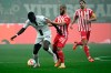 Gladbach's Marcus Thuram, left, and Aissa Laidouni of Union Berlin fight for the ball during the Bundesliga soccer match between Union Berlin and Borussia Moenchengladbach at Borussia-Park stadium, in Moenchengladbach, Germany, Sunday April 23, 2023. (Federico Gambarini/dpa via AP)