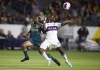 Vancouver Whitecaps forward Cristian Dajome, right, and LA Galaxy forward Raheem Edwards watch the ball during the first half of an MLS soccer match in Carson, Calif., Saturday, March 18, 2023. The Vancouver Whitecaps are acquiring up to US$550,000 in general allocation money from D.C. United in exchange for forward Cristian Dájome. THE CANADIAN PRESS/AP-Ringo H.W. Chiu