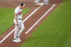Baltimore Orioles starting pitcher Kyle Bradish leaves the game during the third inning of a baseball game against the Boston Red Sox, Tuesday, April 25, 2023, in Baltimore, Md. (AP Photo/Julio Cortez)