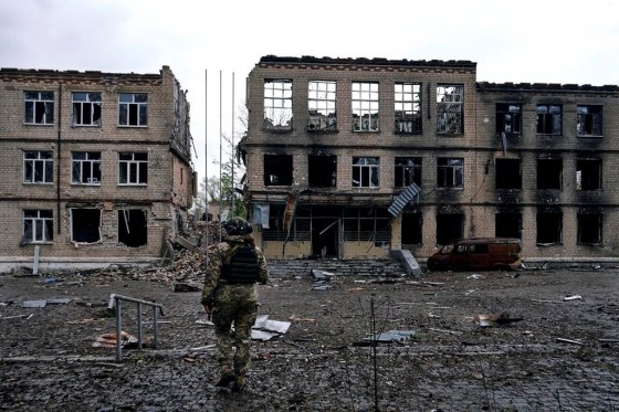 A Ukrainian soldier walks in Avdiivka, the site of heavy battles with Russian troops in the Donetsk region, Ukraine, Tuesday (Libkos / The Associated Press)