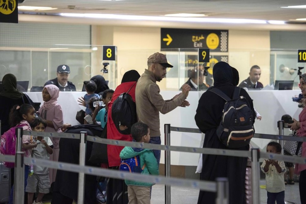 Moroccan citizens repatriated from Sudan, arrive to the Mohammed V International Airport, in Casablanca, Morocco, Wednesday April 26, 2023. (AP Photo)