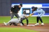 Toronto Blue Jays shortstop Bo Bichette (11) tags out Chicago White Sox centre-fielder Luis Robert Jr. (88) at second base during first inning American League MLB baseball action in Toronto on Wednesday, April 26, 2023. Bichette had a home run and two RBI singles as the Toronto Blue Jays swept the Chicago White Sox with an 8-0 victory on Wednesday afternoon. THE CANADIAN PRESS/Andrew Lahodynskyj