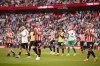 Sheffield United players greet fans at the end of the English FA Cup semi final soccer match between Manchester City and Sheffield United at Wembley stadium, in London, Saturday, April 22, 2023. (AP Photo/David Cliff)