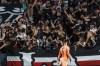 Rayo supporters celebrate behind Barcelona's goalkeeper Marc-Andre ter Stegen after Rayo's Fran Garcia scored his side's second goal during a Spanish La Liga soccer match between Rayo Vallecano and Barcelona at the Vallecas stadium in Madrid, Spain, Wednesday, April 26, 2023. (AP Photo/Pablo Garcia)
