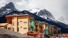 Mountains loom behind homes under construction in Canmore, Alta., Monday, April 24, 2023.THE CANADIAN PRESS/Jeff McIntosh