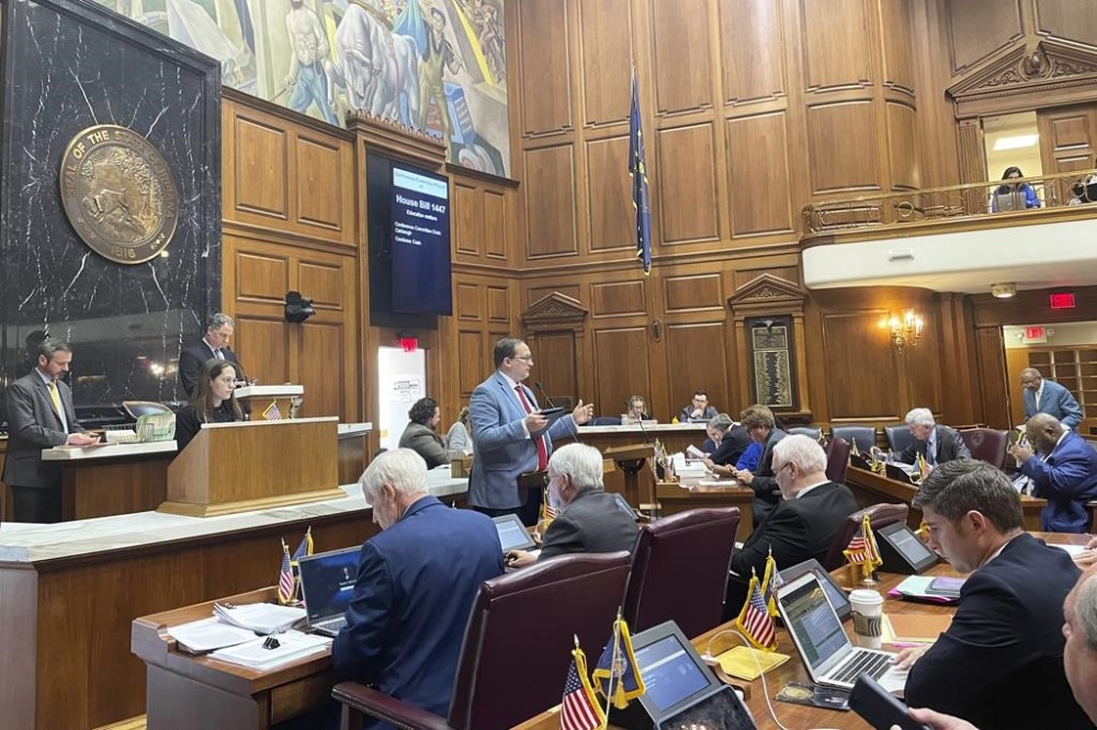 Indiana Republican Rep. Martin Carbaugh speaks before the House on Thursday, April 27, 2023, at the Indiana Statehouse in Indianapolis. Indiana lawmakers that advanced a state House bill that would remove a legal defense for school libraries if their educators are accused of offering library books harmful to students. (AP Photo/Arleigh Rodgers)