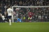 Tottenham's Son Heung-min, left, scores his sides second goal during the English Premier League soccer match between Tottenham Hotspur and Manchester United at White Hart Lane, in London, England, Thursday, April 27, 2023. (AP Photo/Alastair Grant)