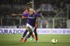 Fiorentina's Dodo, front, and Cremonese's Felix Afena Gyan battle for the ball during the Italian Cup semifinal soccer match at Artemio Franchi Stadium, Florence, Italy, Thursday April 27, 2023. (Massimo Paolone/LaPresse via AP)