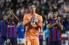 Barcelona's goalkeeper Marc-Andre ter Stegen, centre, Ansu Fati, left and Pedri applaud the fans at the end of a Spanish La Liga soccer match between Rayo Vallecano and Barcelona at the Vallecas stadium in Madrid, Spain, Wednesday, April 26, 2023. (AP Photo/Pablo Garcia)