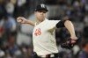 Texas Rangers starting pitcher Jacob deGrom throws during the third inning of the team's baseball game against the New York Yankees, Friday, April 28, 2023, in Arlington, Texas. (AP Photo/Sam Hodde)